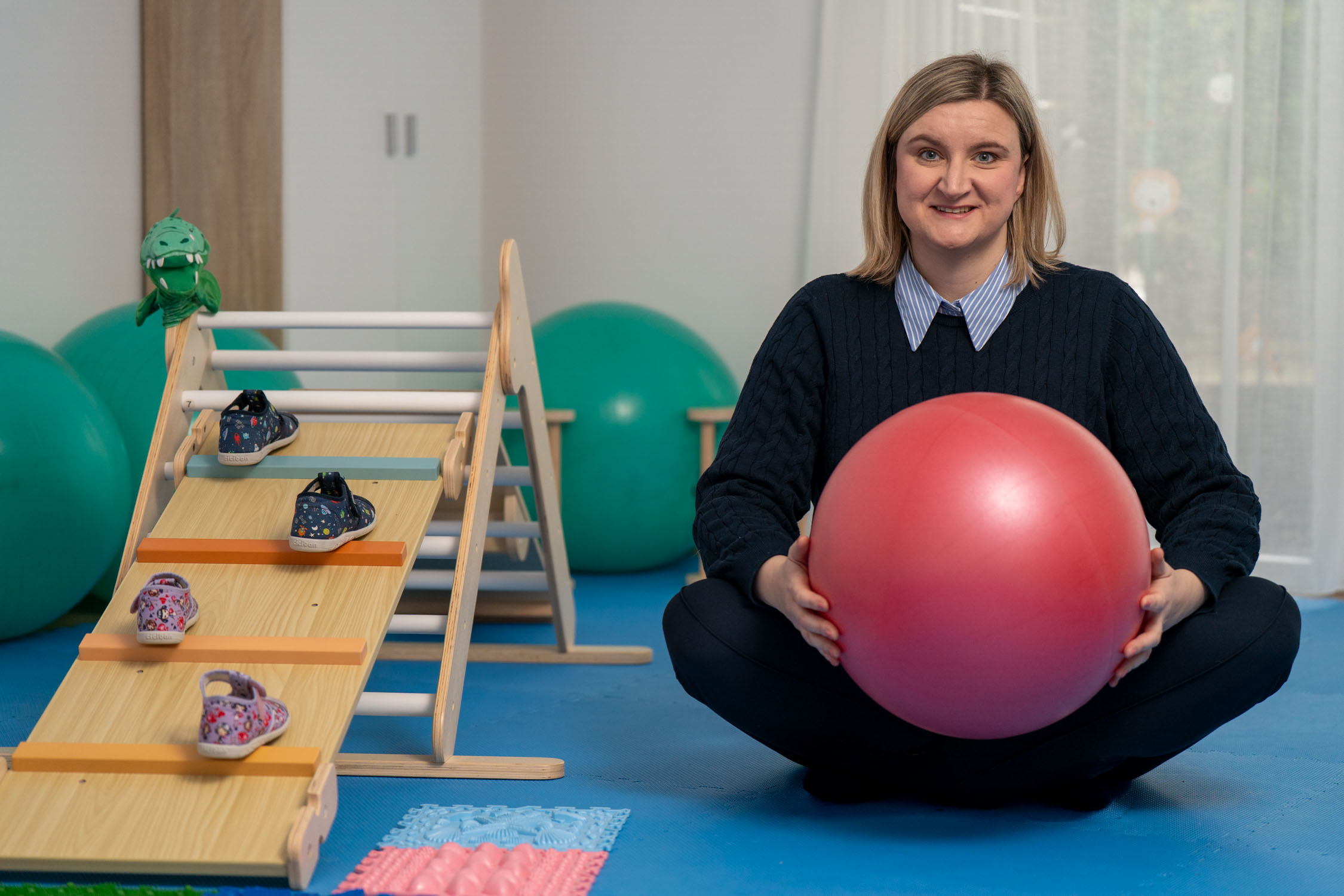Therapist with exercise ball